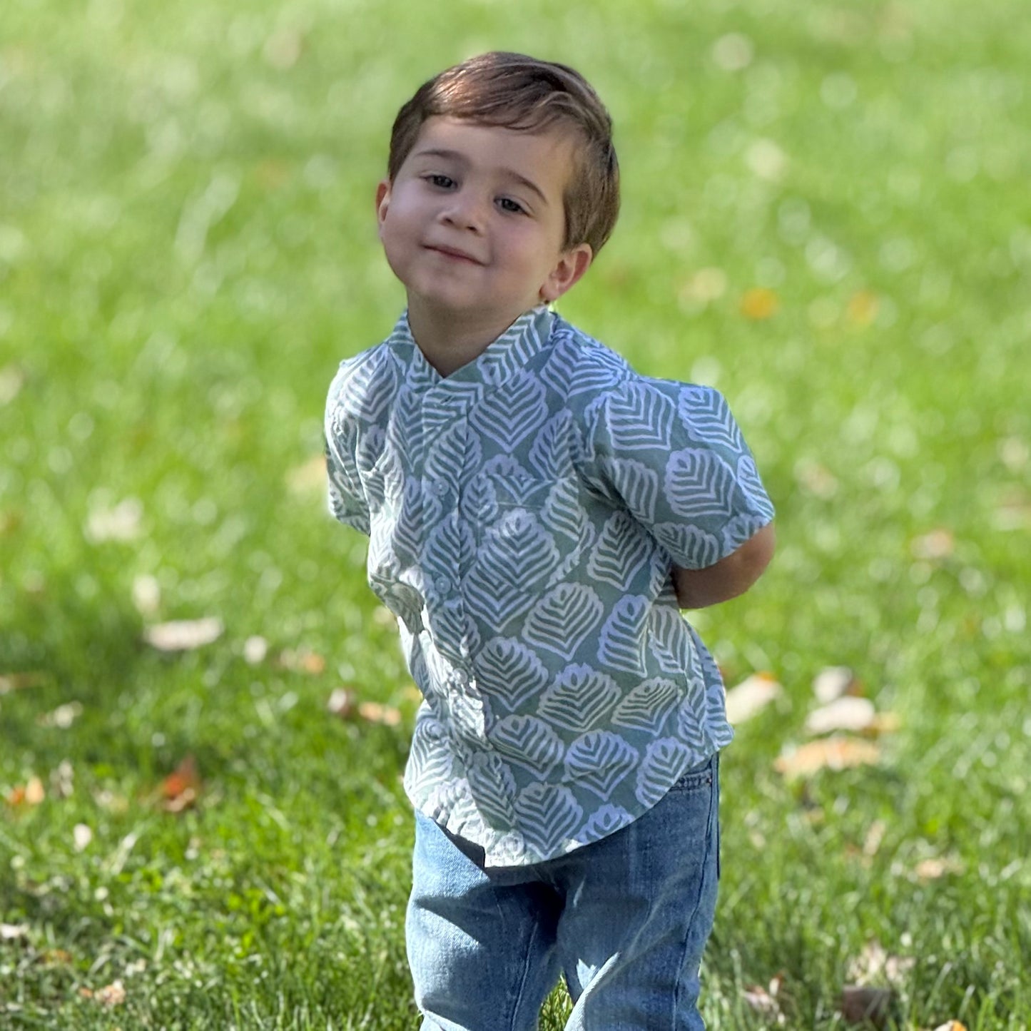 Boy wearing summer earthy shirt