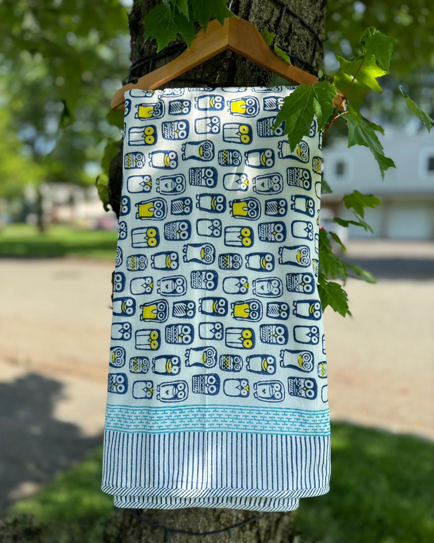 Owl handmade animal print blanket hanging from the tree