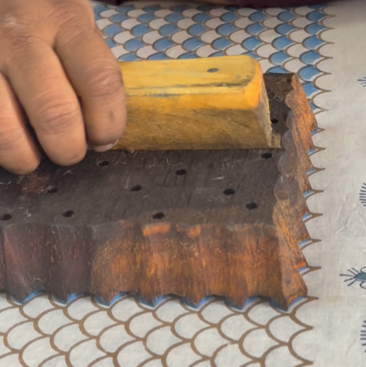 Our mermaid cotton dress being block printed by artisans