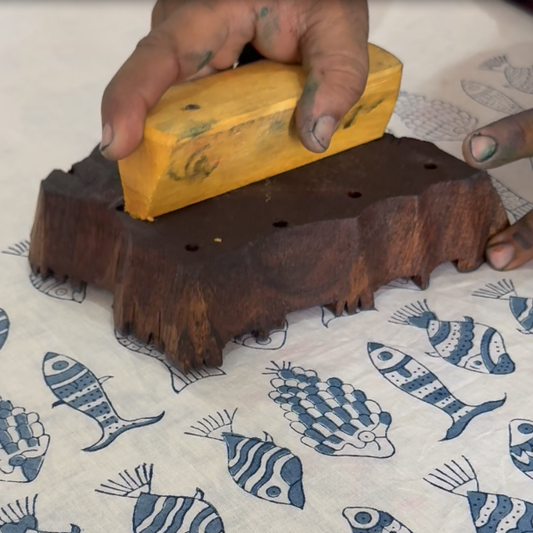 Fabric block printed with fish print
