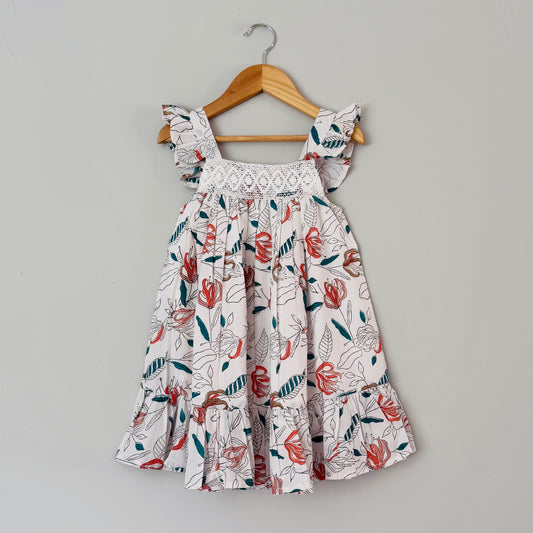 Girls coral floral cotton dress with crochet lace yoke and ruffle sleeves front view breathable summer outfit