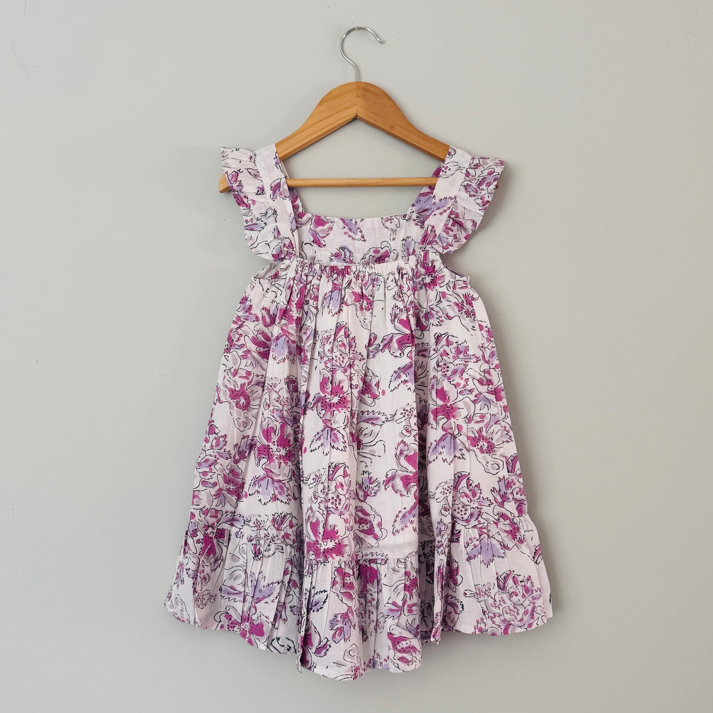 Back view of girls lavender floral cotton summer dress lightweight breathable handmade kids dress for summer wear