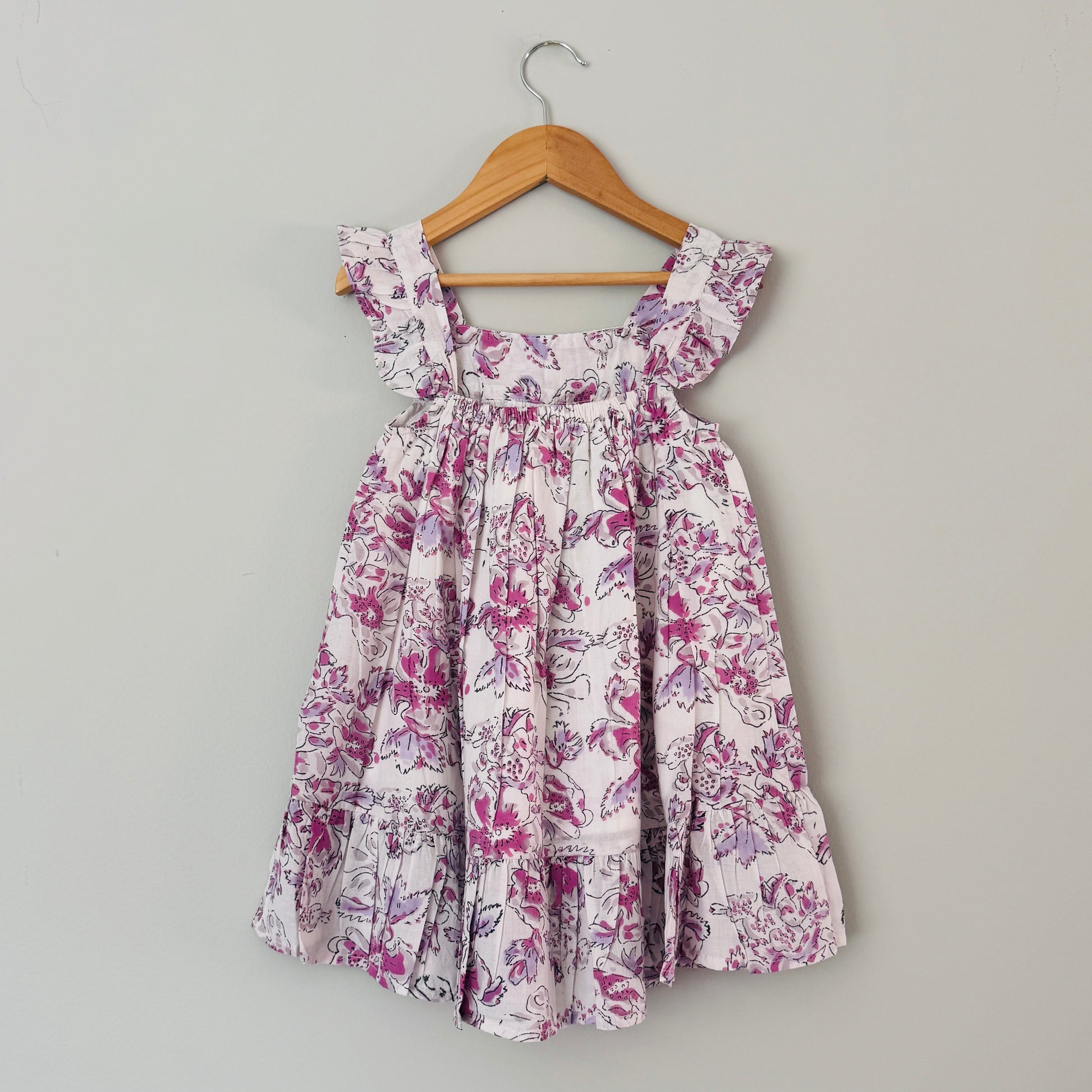 Back view of girls lavender floral cotton summer dress lightweight breathable handmade kids dress for summer wear